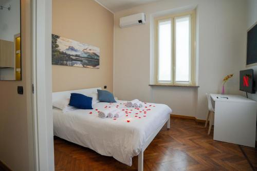 Postel nebo postele na pokoji v ubytování [Azalea Suite] Leonardo Academy, MXP & Lakes