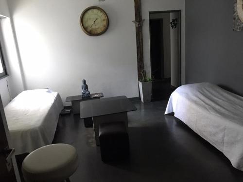 Ένα ή περισσότερα κρεβάτια σε δωμάτιο στο Departamento excelente ubicación