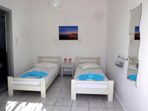 Postel nebo postele na pokoji v ubytování Pavlosx2