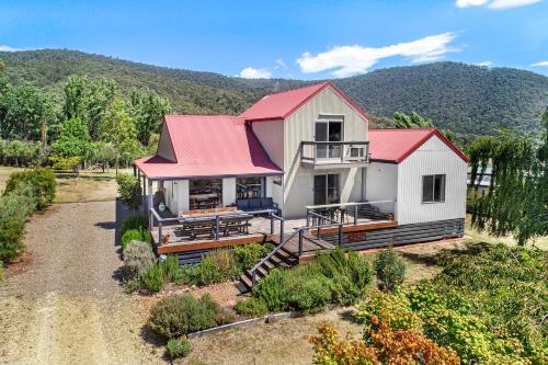 an aerial view of a house with a red roof at Alpine Twin Heights in Mansfield