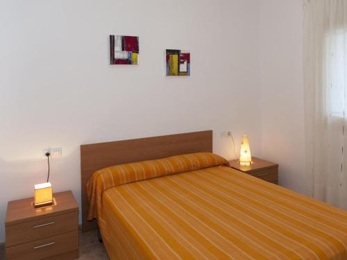 Postel nebo postele na pokoji v ubytování Apartamento con terraza, parking y jardín, a 300m de la playa - ES-228-40