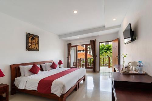 Postel nebo postele na pokoji v ubytování Kusuma Resort Seminyak
