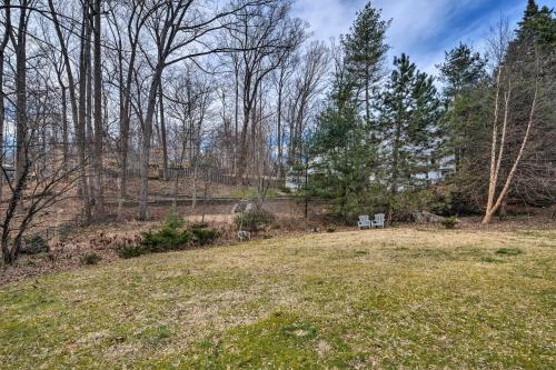a park with a bench in a field with trees at Bethesda Apartment and Yard about 9 Mi to D C in Bethesda