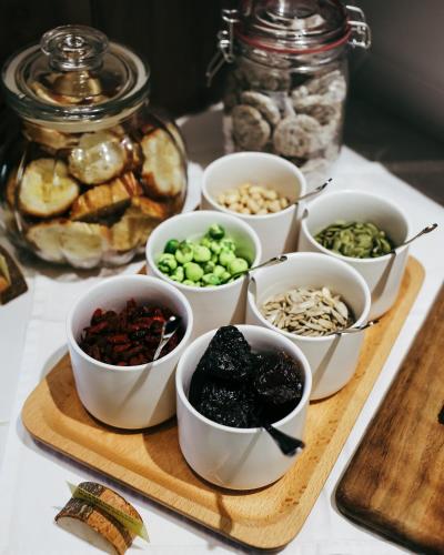 a group of bowls of food on a cutting board at JM Boutique Hotel in Phu Quoc