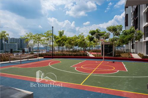 a basketball court in a building with a basketball hoop at Astetica Residences Kuala Lumpur in Seri Kembangan