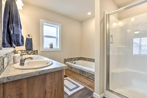 a bathroom with a sink and a shower at Gypsum Home with Patio Between Glenwood and Vail in Eagle