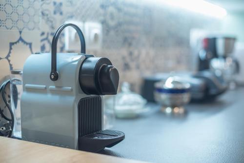 a camera sitting on top of a counter at Athenian Niche in Plaka Villa by Athenian Homes in Athens