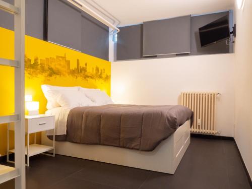 A bed or beds in a room at Blocco Sauli