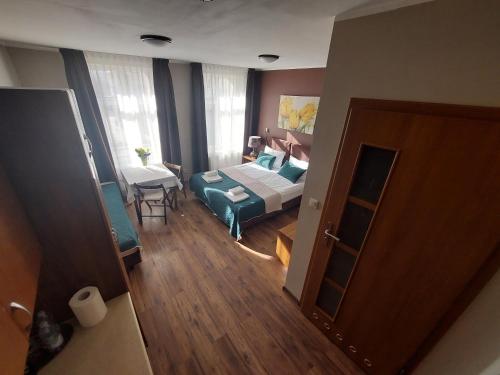 Postel nebo postele na pokoji v ubytování Willa Julia