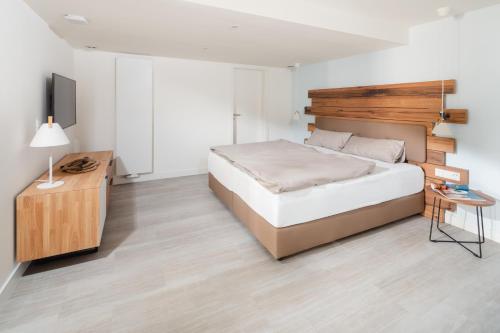 Кровать или кровати в номере Nordstrandperle Ap S2