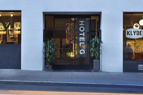 a store front of a store with a sign on the door at Hotel G San Francisco in San Francisco