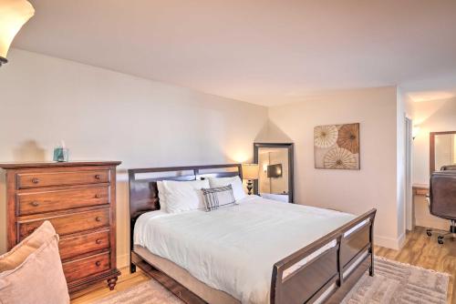 a bedroom with a large bed and a dresser at Scottsdale Resort Condo Near Old Town! in Scottsdale