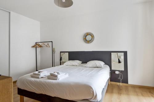 Postel nebo postele na pokoji v ubytování Appartement Corselle - Welkeys
