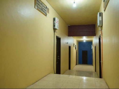 Fotografie z fotogalerie ubytování RedDoorz at Pacet Mojokerto v destinaci Mojokerto