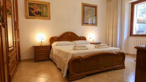 Ένα ή περισσότερα κρεβάτια σε δωμάτιο στο Casa Pia