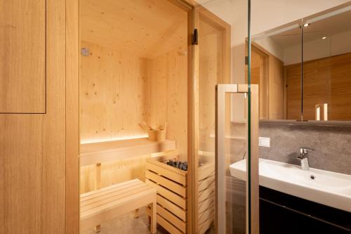 a bathroom with a shower and a sink at BergLeben Zaglauhof in Werfenweng