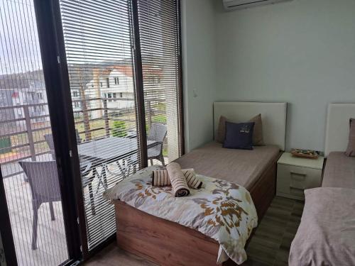 Кровать или кровати в номере Villa Lucija by ROMANTIQUE