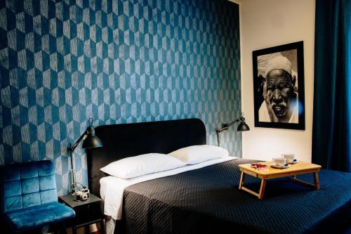 Una cama o camas en una habitación de The Lovers Suite