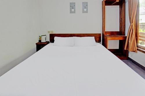 Postel nebo postele na pokoji v ubytování Tastura Homestay