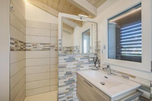 Koupelna v ubytování Baita Marina - Tramontana 30m mare