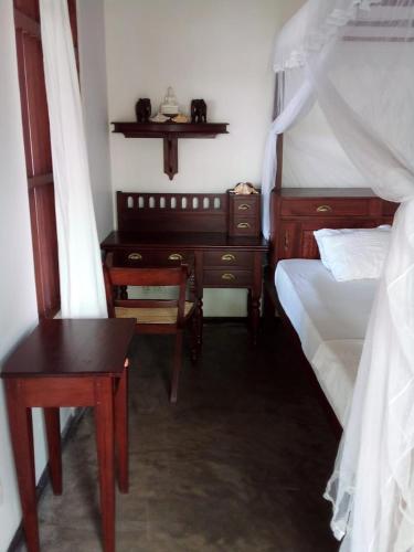 Postel nebo postele na pokoji v ubytování Thanu Beach Villa
