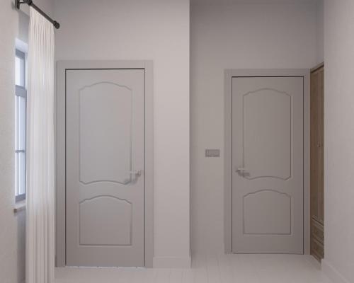two doors in a room with white walls at Leo SereneS Hotel in Alacati