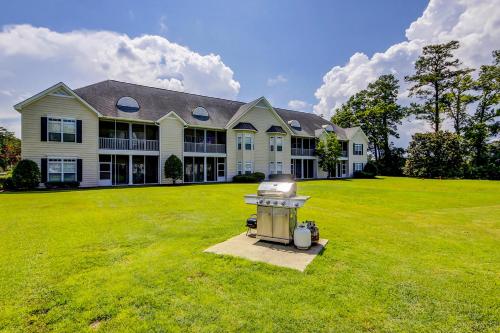 a large house with a grill in the yard at Scotch Broom E-104 in Little River