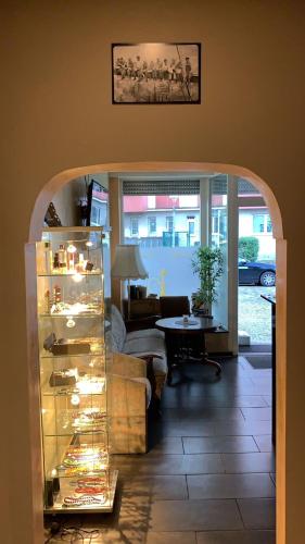 a living room with a couch and a table at Elifim in Berlin