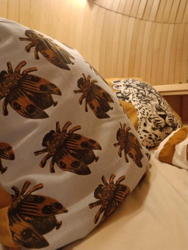 Postel nebo postele na pokoji v ubytování les Refuges du Chalet