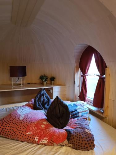 Postel nebo postele na pokoji v ubytování les Refuges du Chalet
