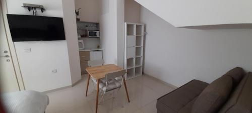 TV a/nebo společenská místnost v ubytování Regina's place