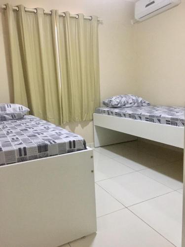 Katil atau katil-katil dalam bilik di Flats Integração