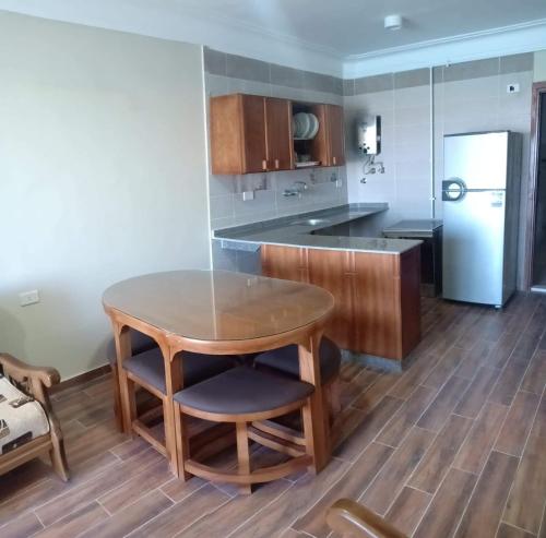 Kuchyň nebo kuchyňský kout v ubytování L’amour Hotel apartment