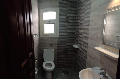 Koupelna v ubytování L’amour Hotel apartment