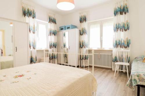 Postel nebo postele na pokoji v ubytování Casa Linda, a due passi dal mare