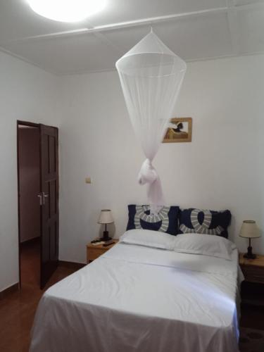 Katil atau katil-katil dalam bilik di Landa's Guest House