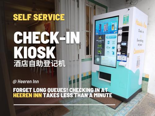 a self service check in kiosk in a building at Heeren Inn Melaka in Malacca