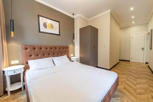 Cama o camas de una habitación en DayFlat Apartments on Mykhailivs'ka
