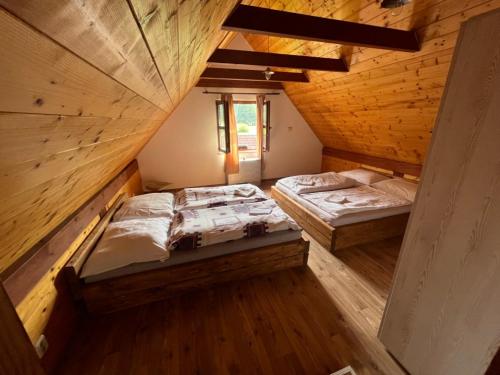 an overhead view of a bedroom with two beds at Chalupy v Podkrkonoší- Chalupa Oto, Chalupa Prade in Hostinné