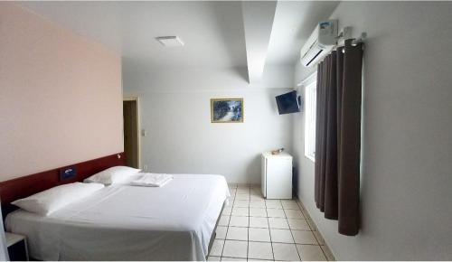 Katil atau katil-katil dalam bilik di Alpha Ville Hotel