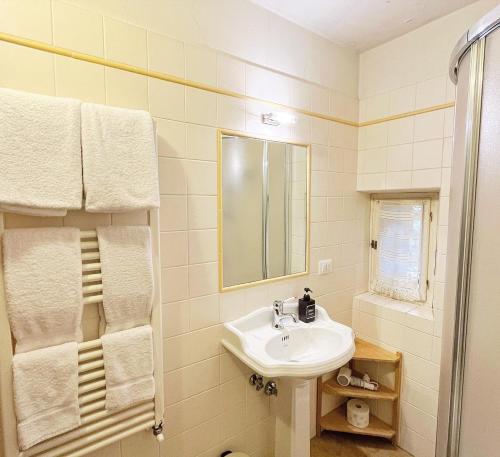 a bathroom with a sink and a mirror at Cimabue 9 in Florence