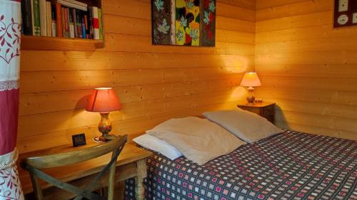 Posteľ alebo postele v izbe v ubytovaní Appartement dans petit chalet