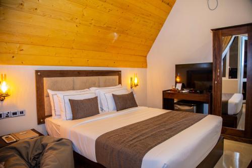 Postel nebo postele na pokoji v ubytování Royal Classic Resort