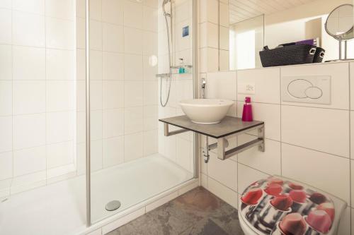 Koupelna v ubytování Alpenkräuter Hotel Bären