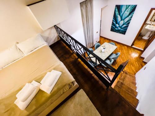 A bed or beds in a room at IREX Spanish Steps private apartment
