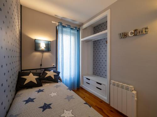 Postel nebo postele na pokoji v ubytování Apartamentos Ca de Marti