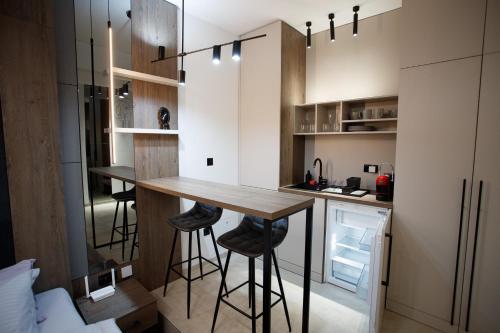 Η κουζίνα ή μικρή κουζίνα στο Prime Apartment Kragujevac