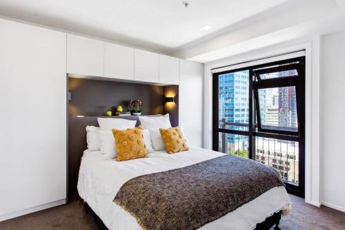 1BR with Stunning Harbour Views - Netflix - WiFi tesisinde bir odada yatak veya yataklar