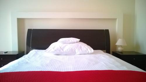 Łóżko lub łóżka w pokoju w obiekcie Yuca