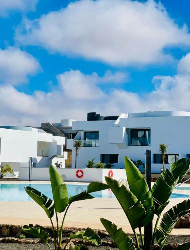 a view of the villas from the beach at CASA MIRABEL in Villaverde